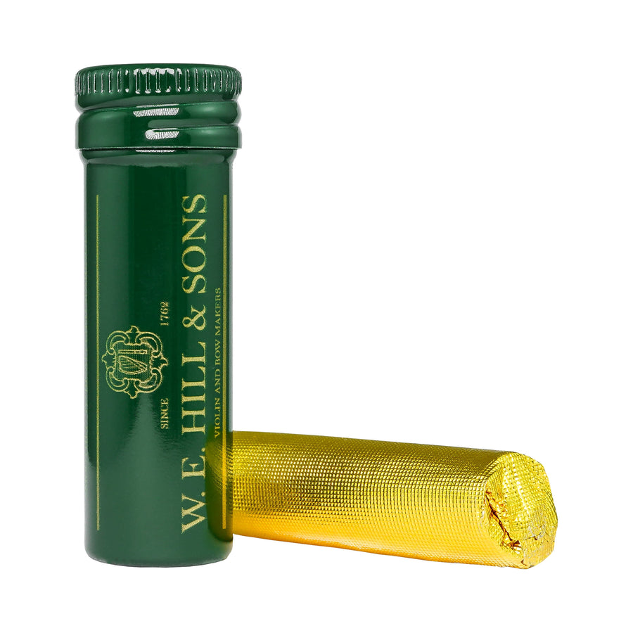 Batom de cravelha W. E. Hill & Sons: tubo verde e bastão em papel dourado